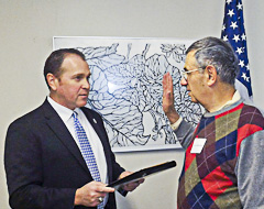 In Governor's office, Edward A. Palleschi administers oath to Jerry Halberstadt