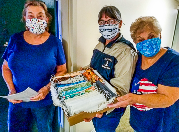 Team of neighbors distribute masks to all tenants: Cheryl, Judy, Irene