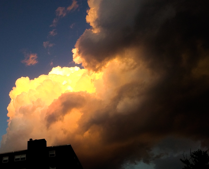 Storm clouds loom over apartment building