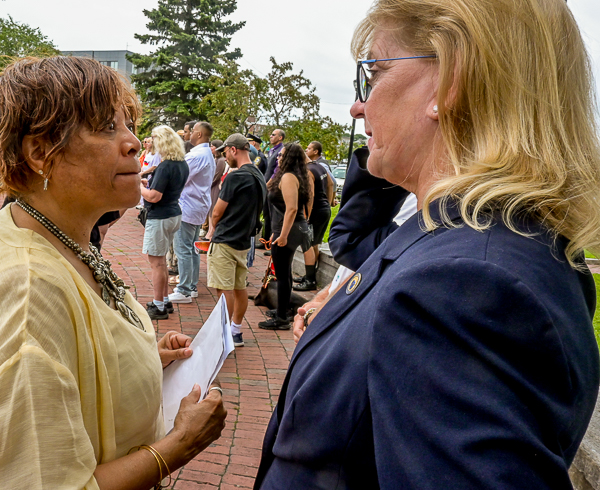 Doreen Wade confers with Senator Joan B. Lovely