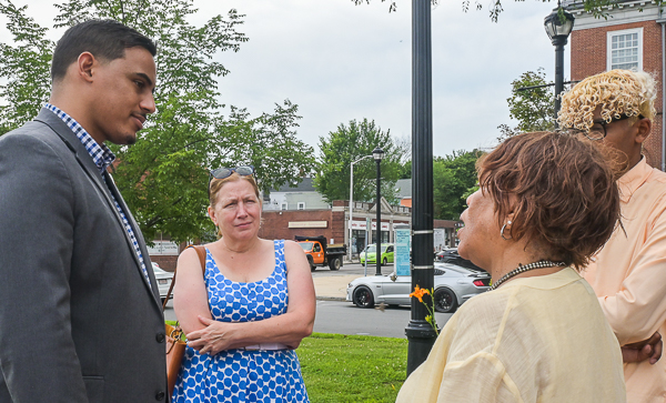 State Representative Manny Cruz, left, chats with Doreen Wade