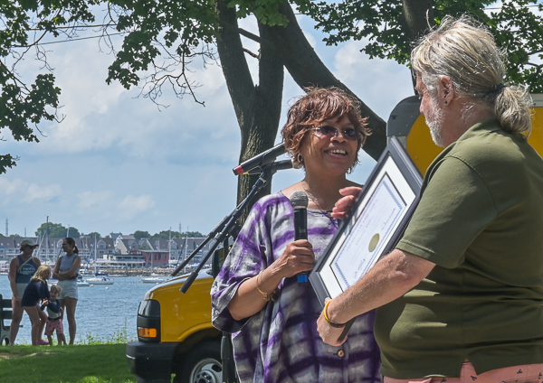 Doreen Wade presents gift to Giovani