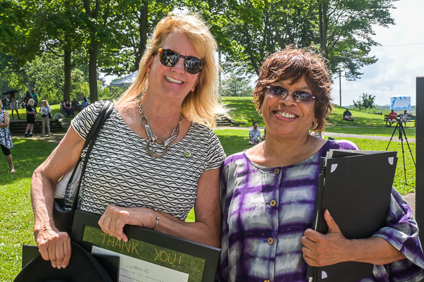 Senator Joan B. Lovely (L) holds plaque presented by Doreen Wade (R) as thanks for making Negro Election Day an annuals state holiday