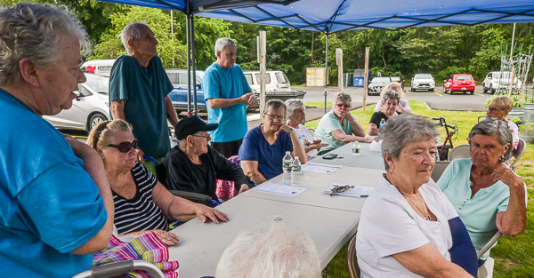 Donna seeks to build a bridge with members of the Apple Village Association 