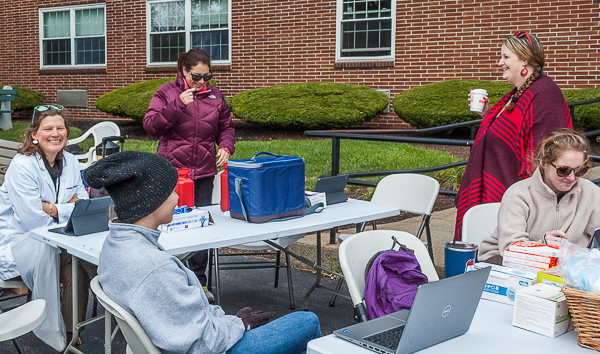 Under cloudy sky, Board of Health staff ready for flu clinic