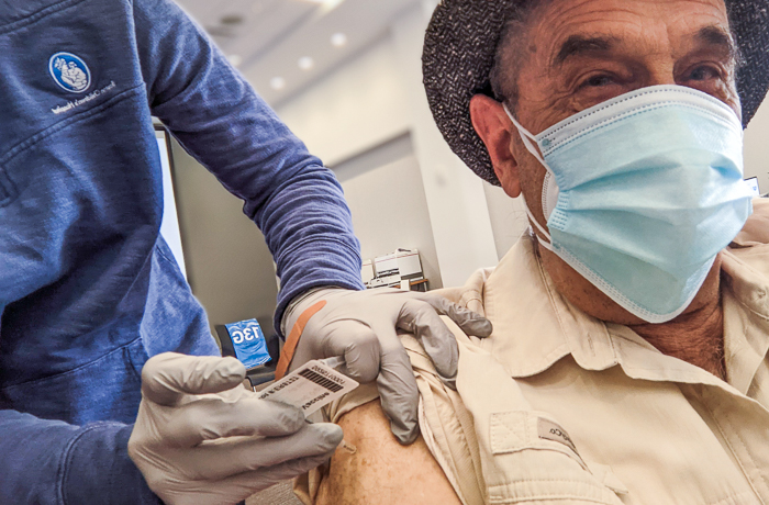 Jerry Halberstadt being vaccinated