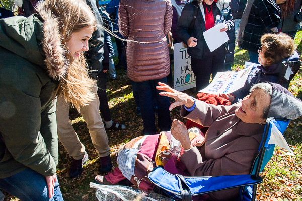 Anna Ornstein talking with young resident of Reading